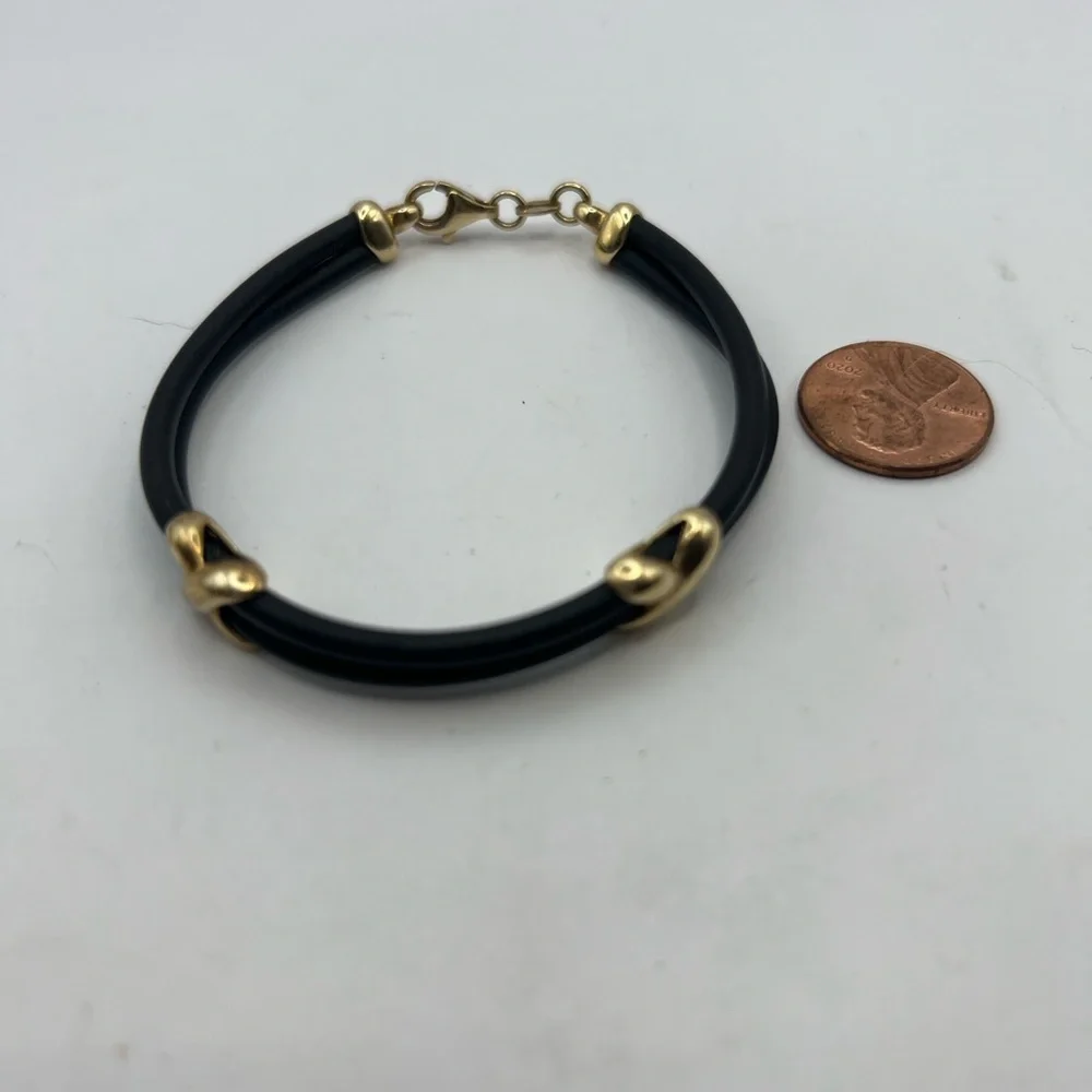 KA 1772 925 Italy Double strand leather bracelet with gold tone Accents.